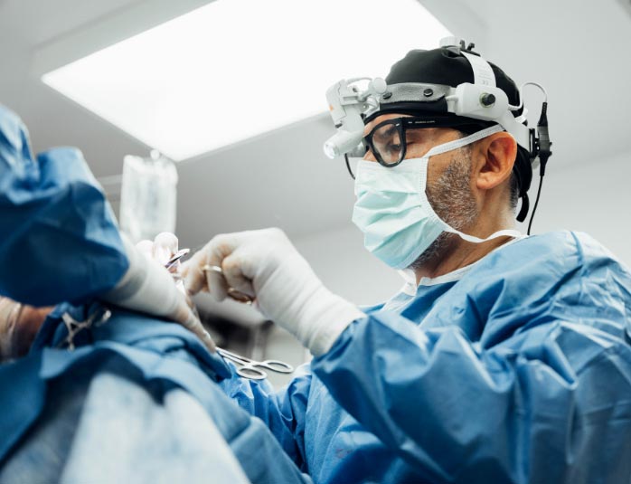 Dr. David Saadat performing surgery
