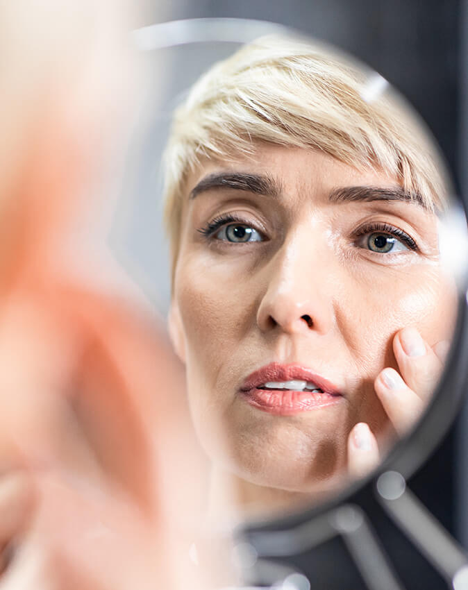In Mirror -- Eyelid Surgery in Beverly Hills